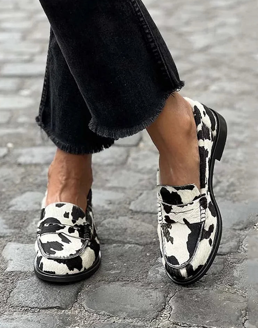 Halvorne | Women's Cow Print Penny Loafers - Image 1
